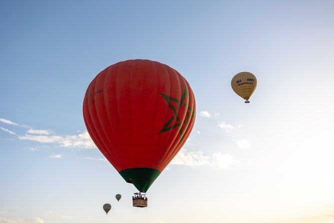 Hot air balloon flight in the desert of Marrakech in front of the atlas